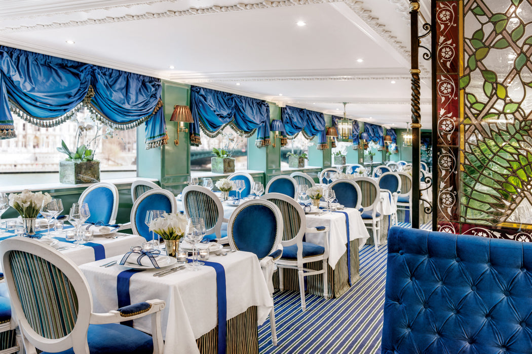 Decorative restaurant interior with blue and white theme. S.S. Catherine
